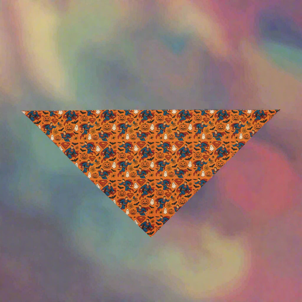 Halloween-themed triangle bandana with pumpkins and ghosts on an orange background